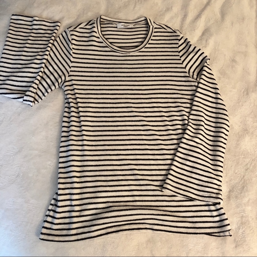 Flattering tunic top with adorable details!